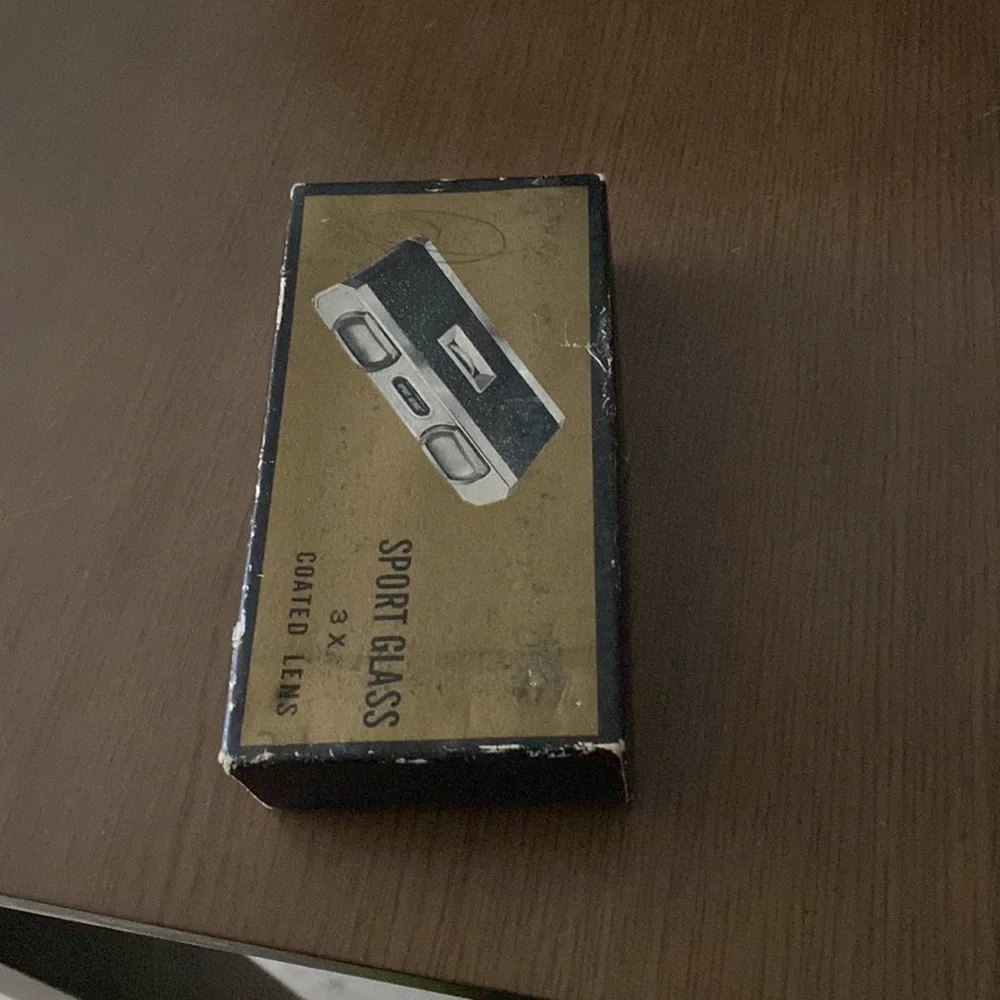 Antique binoculars in silver and black